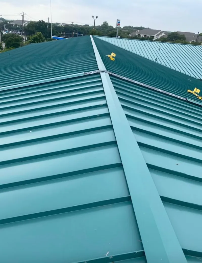 Green commercial metal roof ridge and valley for Metal Roof Repair in Carbondale